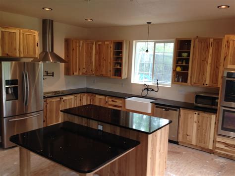 kitchen with hickory cabinets and stainless steel appliances|farmhouse kitchen with hickory cabinets.